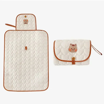 Tapis à Langer Nomade Pliable & Imperméable | Nouveau-né